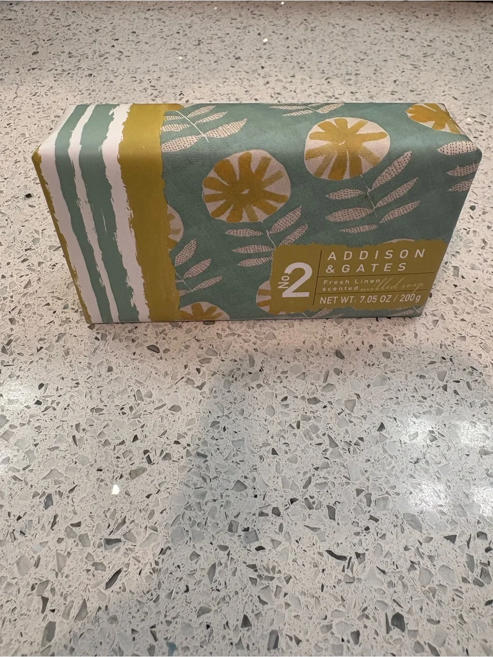 Collection of four assorted wrapped soaps